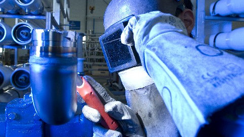 Photo of a welder working on a project