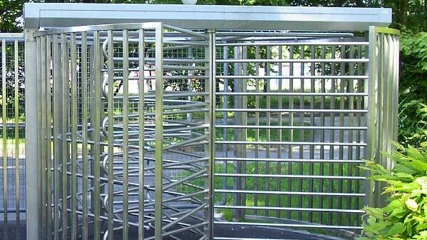 Extra wide full height external turnstiles with canopy