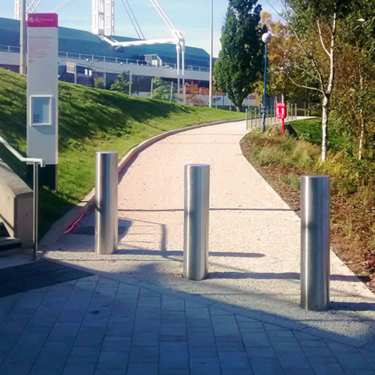 Static crash rated bollards protecting a pedestrian path