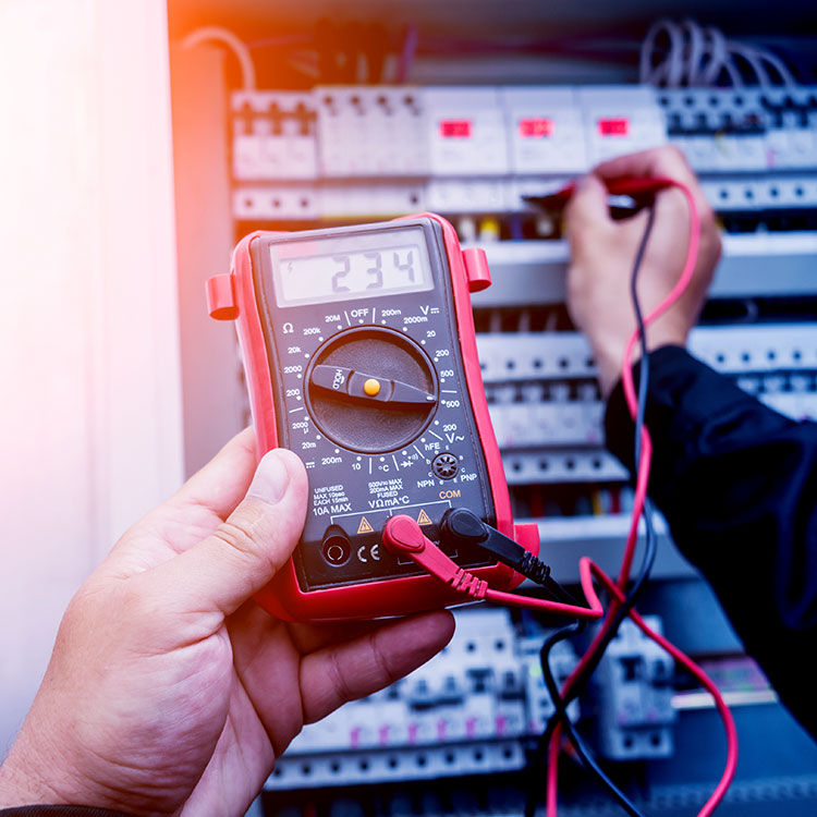 Electrician diagnosing an electrical problem