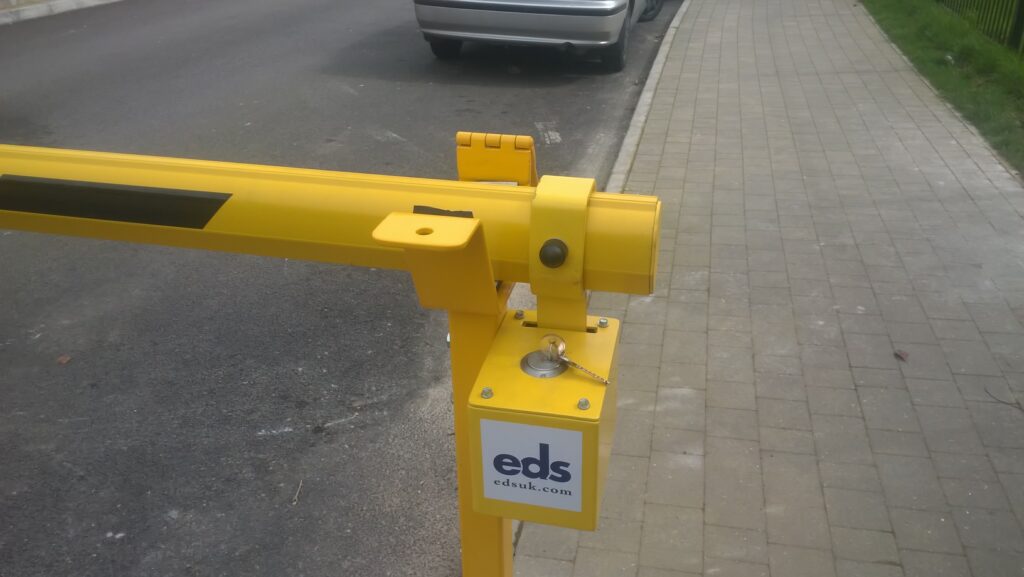 EDS manual barrier arm across the entrance to a residential estate