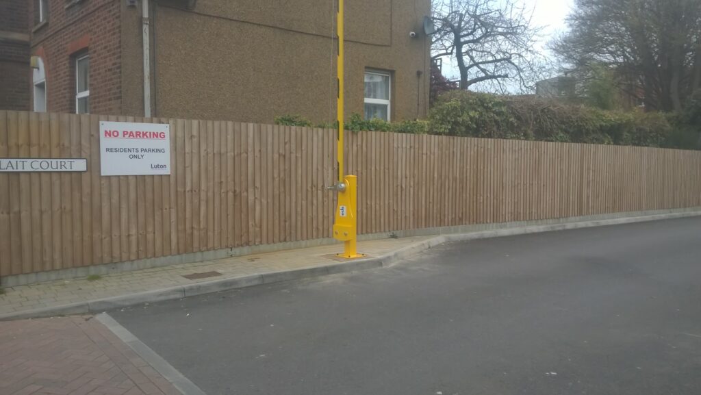 EDS manual barrier arm raised to allow entrance to a residential estate