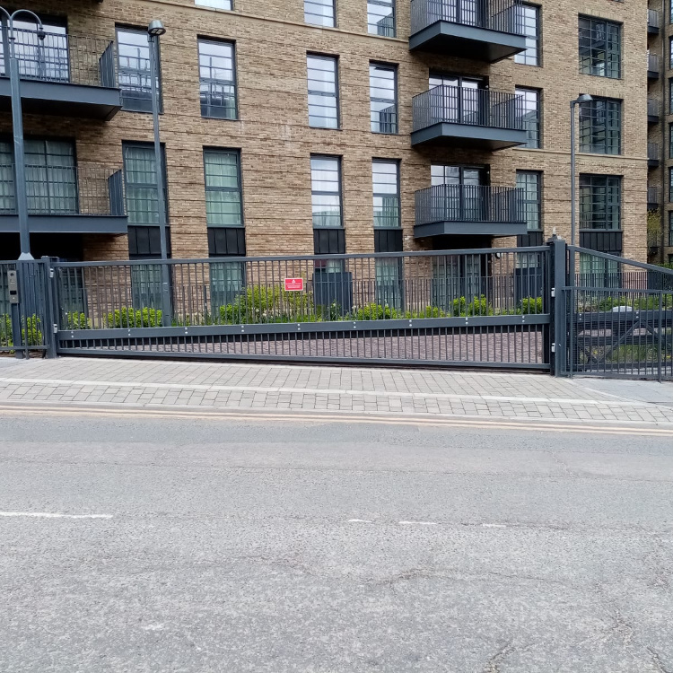 Automatic sliding gate installed on a slope