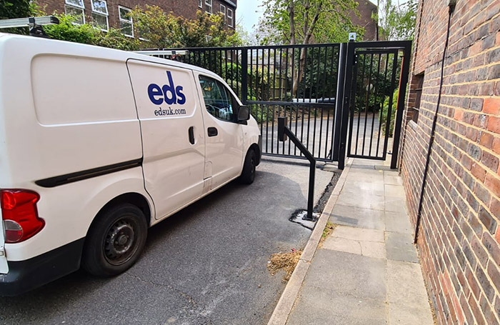 Photo of EDS van outside an automated gate