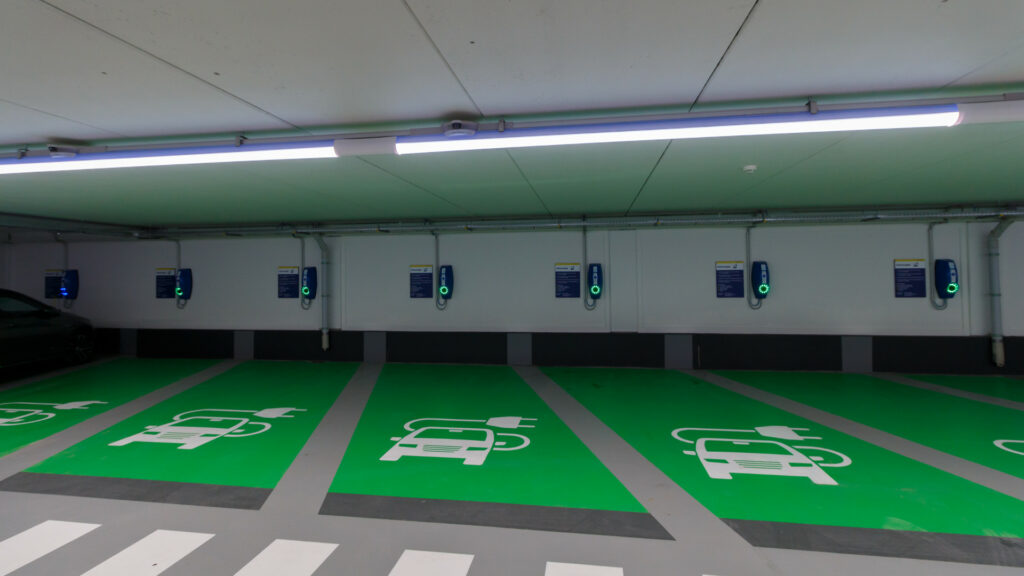 Wall-mounted electric car charging points in underground car park