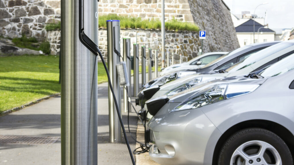 Line of electric car charging points in use
