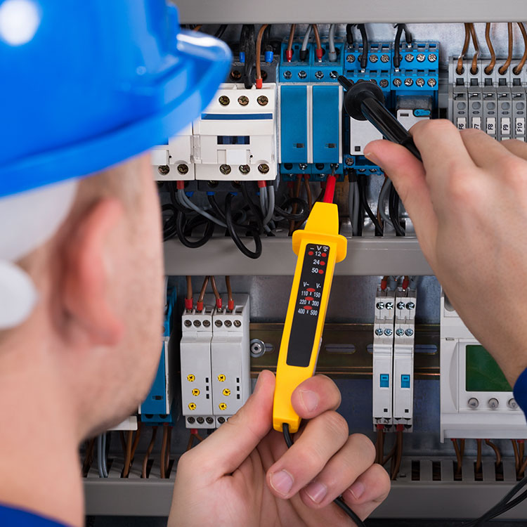 Electrician performing maintenance
