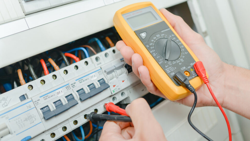 Electrician performing a periodic inspection