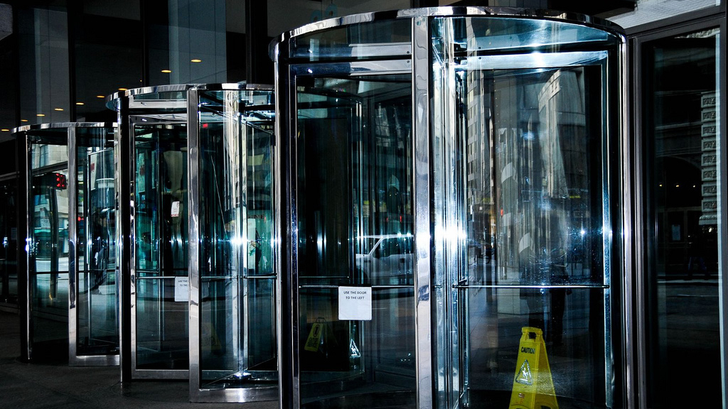 Automatic glass revolving doors