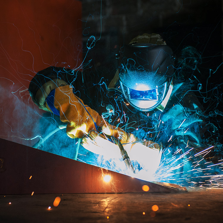 Photo of a welder working on a project